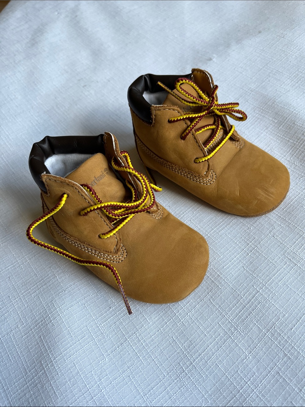 Timberland Lace-Up Boots Infant Crib Booties in wheat nubuck.
Size 3